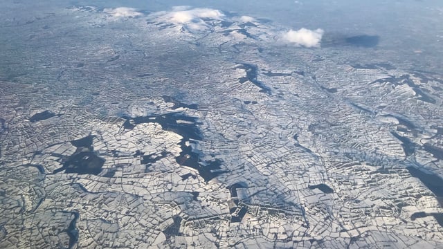 Pics: South-east still snow-covered as today brings a mix of sun and showers