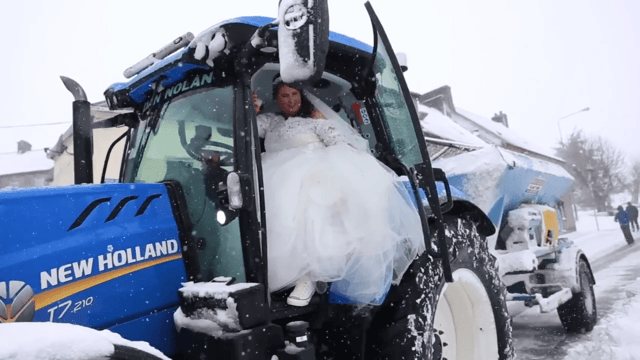 Watch: Storm and snow prove no obstacle to these newly-weds