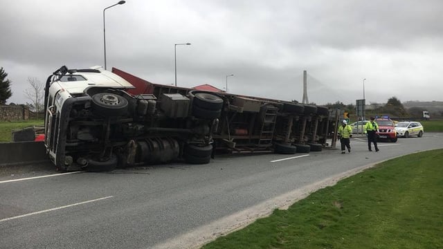 Overturned lorry scatters chickens onto motorway