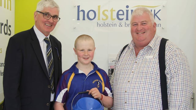14-year-old raises £1,800 after shaving head for 'proud papa'