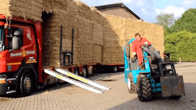 Is this the ultimate way to haul and unload straw?