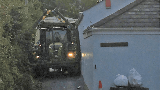 Rock and hard place: Tractor driver mishap