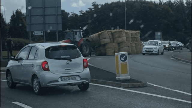 Trailer of bales overturns in Donegal