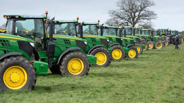 Auction report: Sample 6R/M Series tractor prices from giant sale