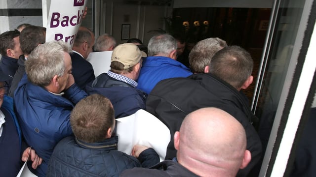 Security worker injured during IFA loan sale protest in Dublin