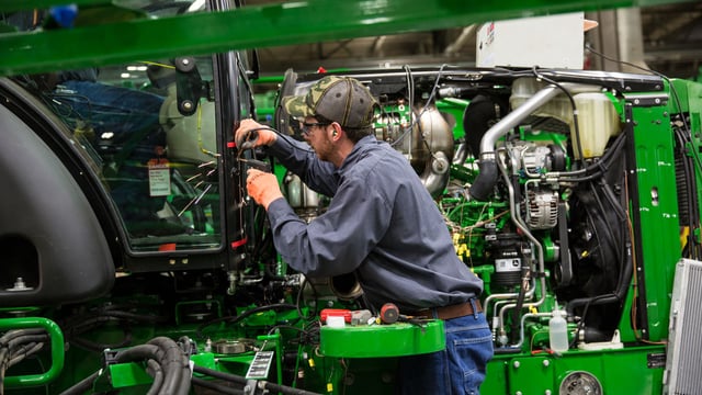 John Deere to cut back production in some factories