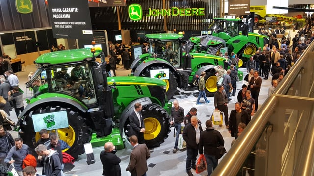 How many tractors of each brand were sold in April?