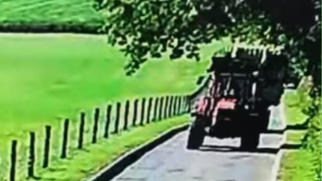 Video: Bale trailer breaks loose from towing tractor