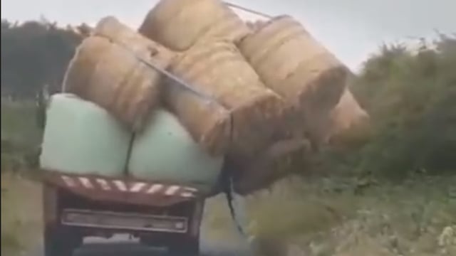 Video: Off-balance bales send trailer teetering