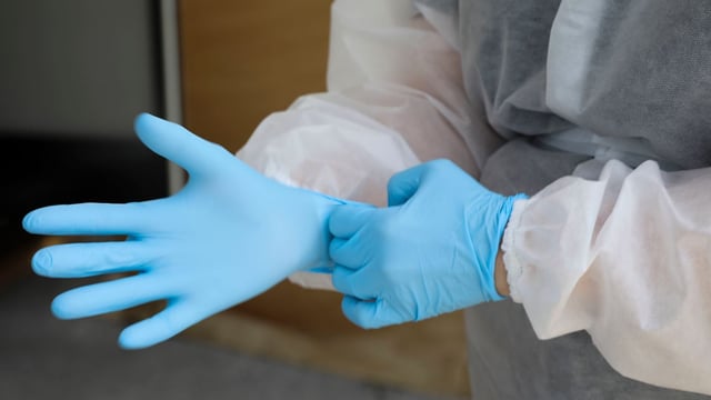 Extra PPE provisions sought for department staff at meat plants
