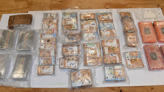 Man arrested after €1 million worth of suspected drugs and cash found in field