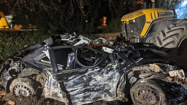 Lack of fatalities in collision between tractor and car described by police as a 'miracle'