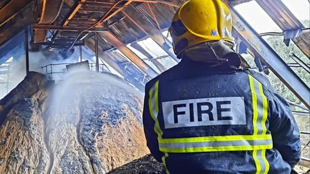 Pics: Cork fire crews deal with 'hotspots' 3 days on from R&H Hall fire