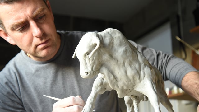 Sculpture depicting bulls and cattle carves out niche for artist
