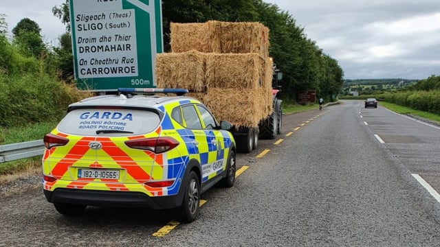 'Writing on the wall' for tractor driver drawing bales