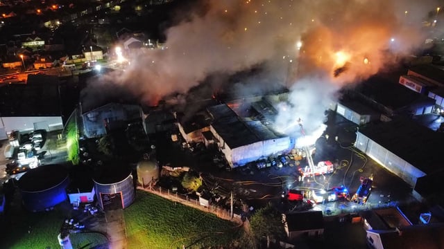 Firefighters battle blaze at former poultry factory