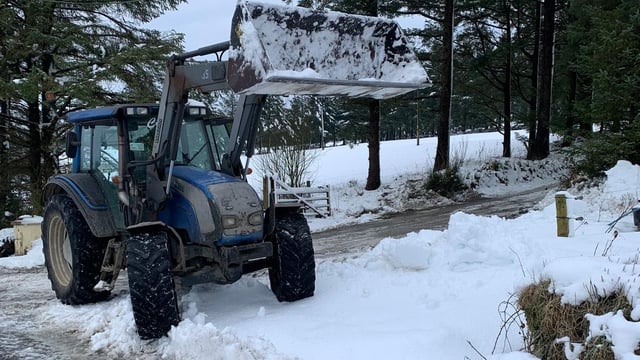 Watch: Farmers continue to help those cut off by snow