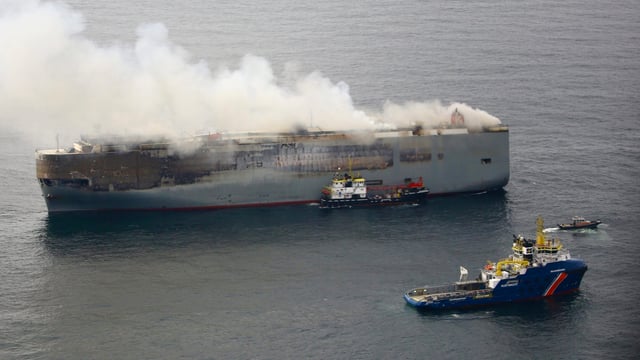 Electric vehicles: Fire on car carrier sparks discussion over battery safety