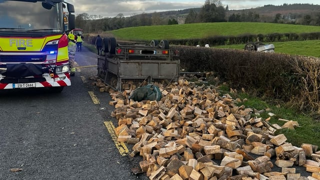 Car collides with trailer carrying logs on Laois road