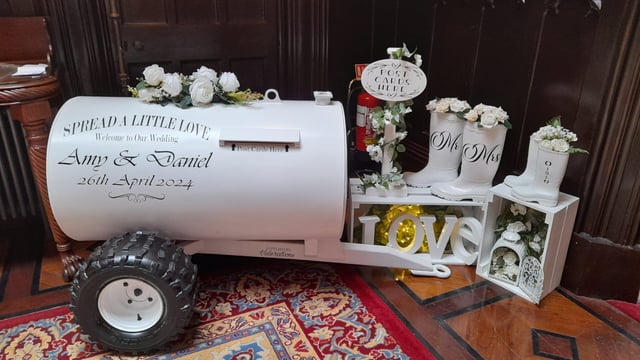 Couple spread the love with farm-themed wedding displays
