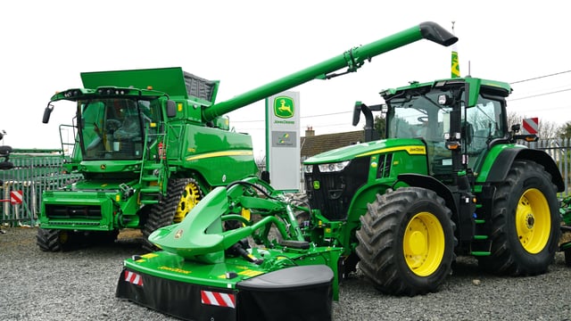 John Deere cuts production and jobs as sales fall
